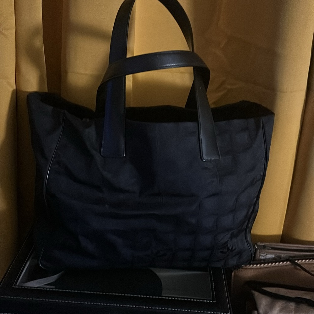 Authentic Chanel travel tote black